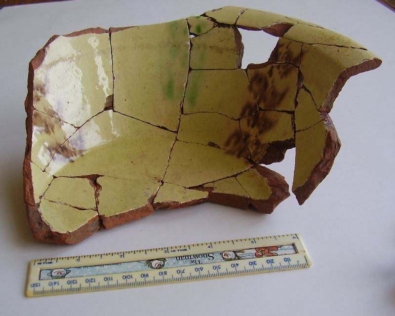 Yellow-glazed bowl, reconstructed